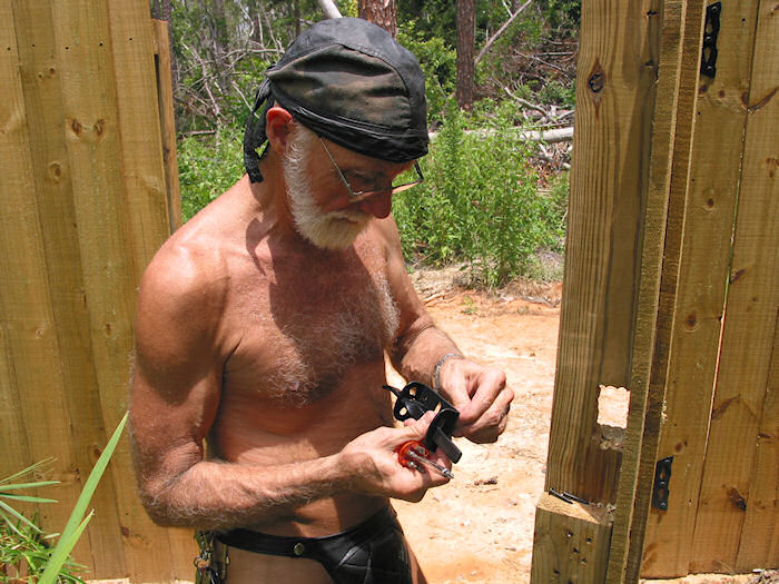 Leatherjocked Craftsman intent on his job.